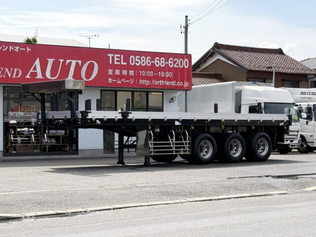 トレクス：平床セミトレーラー：アオリ20㎝：5方開：3軸：板バネ：最大積載量28.500㎏